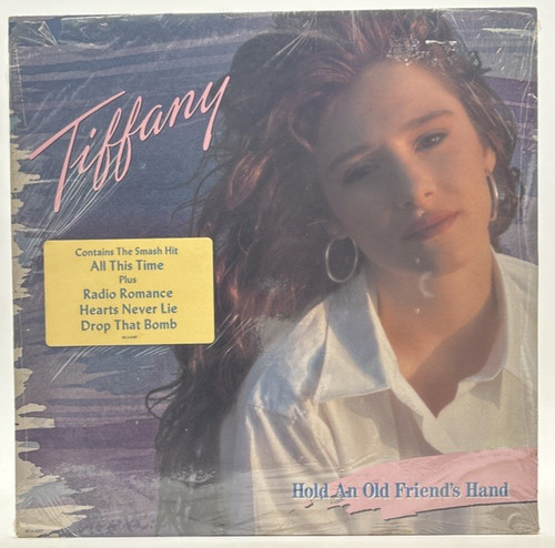 New sealed tiffany hold an - /,